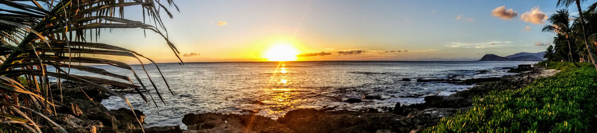 Scenic view of sea against sky during sunset