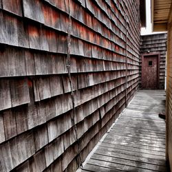 Brick wall with building in background