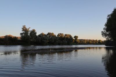 Scenic view of lake against clear sky