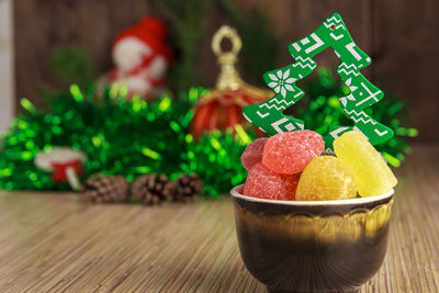 Close-up of christmas decorations on table