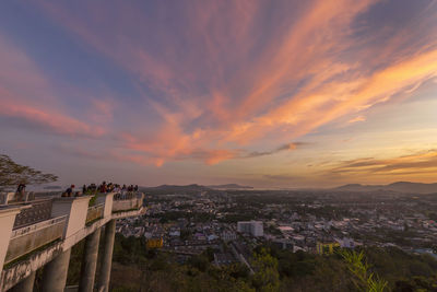 High angle view of buildings against sky at sunset