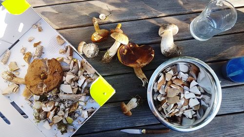 High angle view of prepared edible mushrooms on table