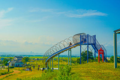 Bridge over sea against sky