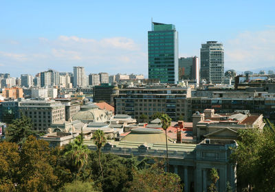 Buildings in city against sky