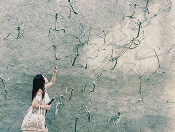 Woman on wall