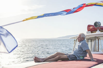 Senior man on a boat trip