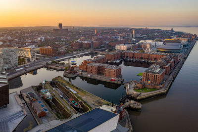 High angle view of river amidst buildings in city