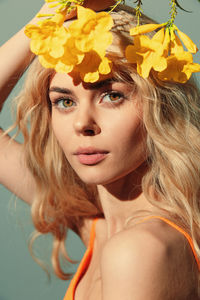 Close-up of young woman wearing hat