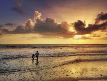 Scenic view of sea at sunset