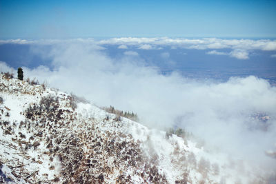 Scenic view of snowcapped mountain against sky