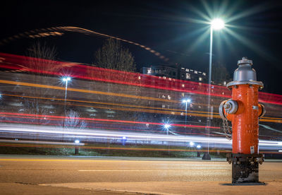 Fire hydrant on road at night