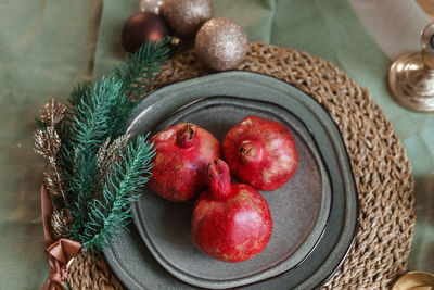 Serving a festive christmas table in scandinavian style. decor on the table before the holiday