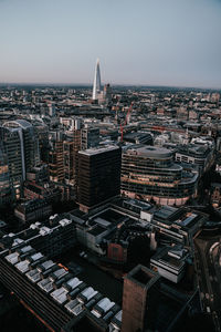 High angle view of city buildings against sky