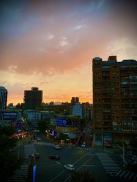 High angle view of buildings against sky during sunset