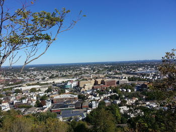 Cityscape against blue sky