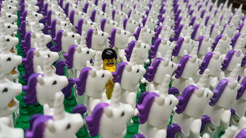 Full frame shot of figurines on wood
