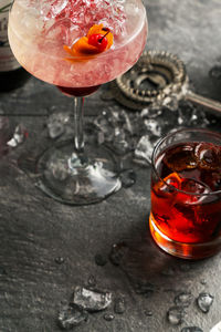 High angle view of drinks on slate