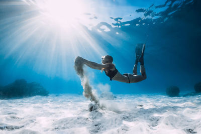 Man swimming in sea