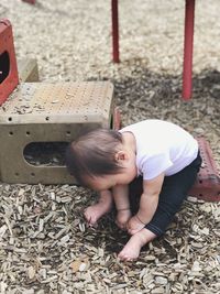High angle view of cute baby outdoors