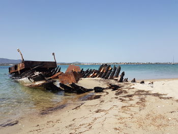 Panoramic view of abandoned beach against clear sky