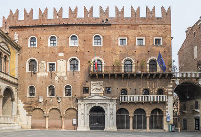 The beautiful piazza dante in verona with historic buildings with beautiful facades