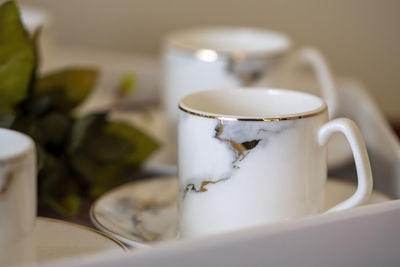 Close-up of tea cup on table