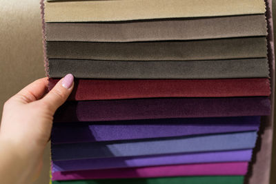 Catalog of multi-colored fabric samples. textile industry background.