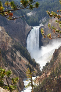 Scenic view of tree mountain against sky