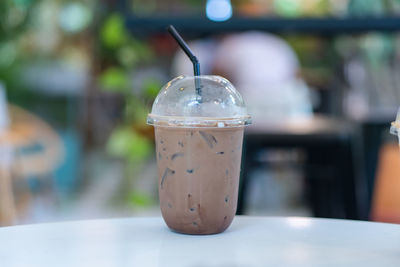 Close-up of coffee cup on table