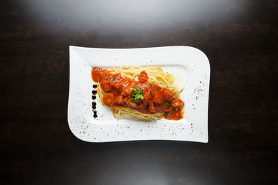 High angle view of serving food in plate