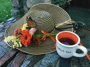 Close-up high angle view of butterfly on flower