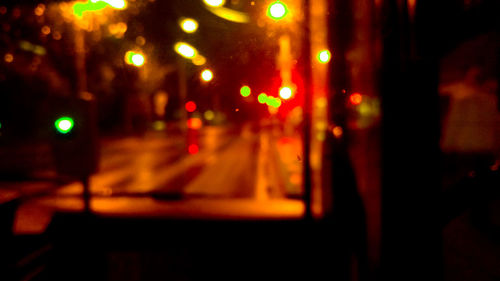 Blurred motion of car on street at night