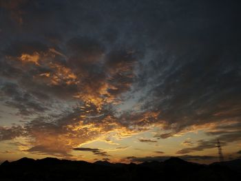 Scenic view of dramatic sky during sunset