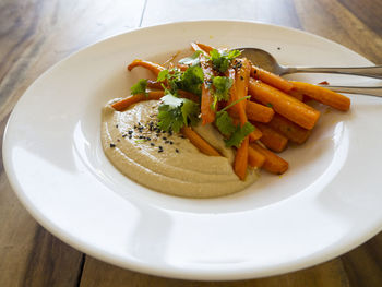 Close-up of food in plate on table