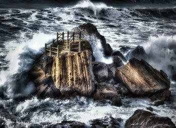 Waves splashing on rocks