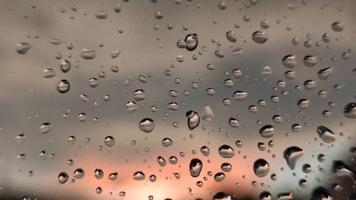 Full frame shot of wet glass window