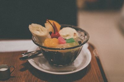 Close-up of ice cream in glass on table