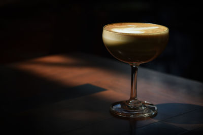 Close-up of wine glass on table