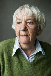 Close-up thoughtful of senior woman at home