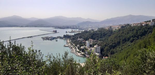 High angle view of trees and mountains against sky