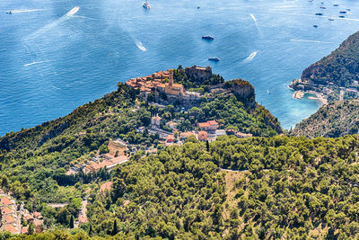 High angle view of townscape by sea