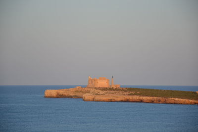 Scenic view of sea against clear sky