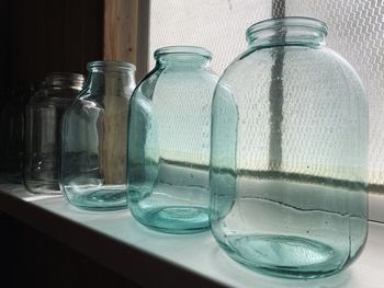 Close-up of glass bottle on table