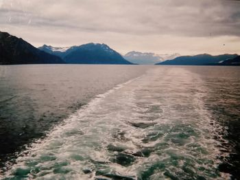 Scenic view of sea against cloudy sky