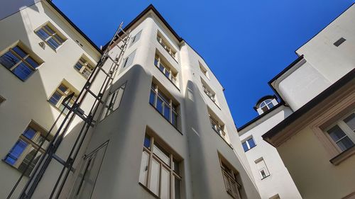 Low angle view of residential building against sky