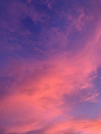 Low angle view of dramatic sky during sunset