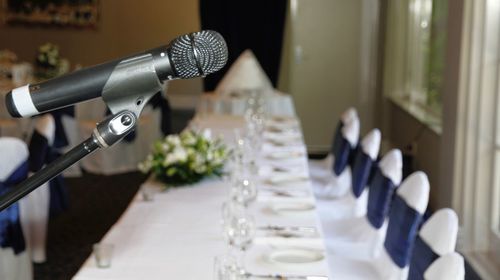 Close-up of microphone at dining table