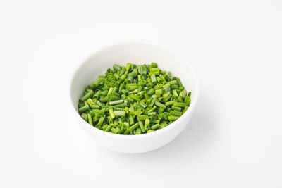 Directly above shot of salad in bowl against white background