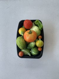 High angle view of fruits in bowl on table