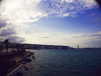 View of river against cloudy sky